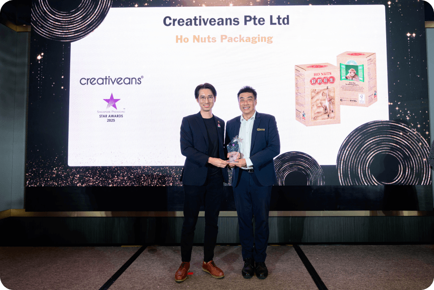 Creativeans consultants presenting brand strategy on stage