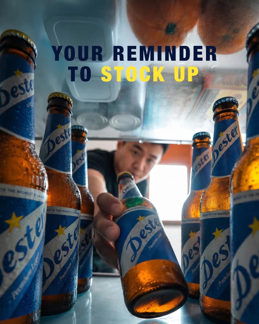 Fridge filled with beer bottles; a person reaches in to grab one, overlaid with 'Your reminder to stock up'.